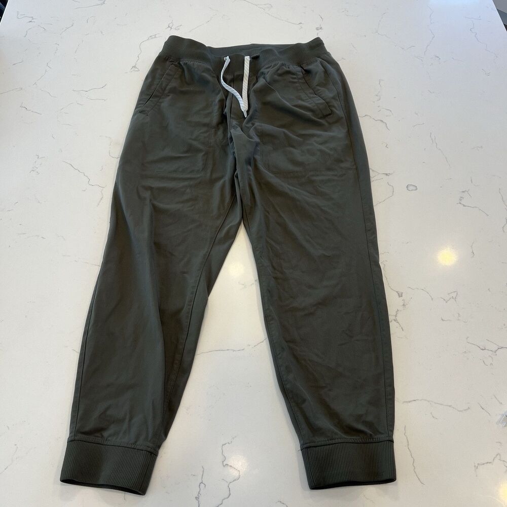Vuori Meta Joggers Men Large Athletic Performance Stretch Pants Green Athleisure